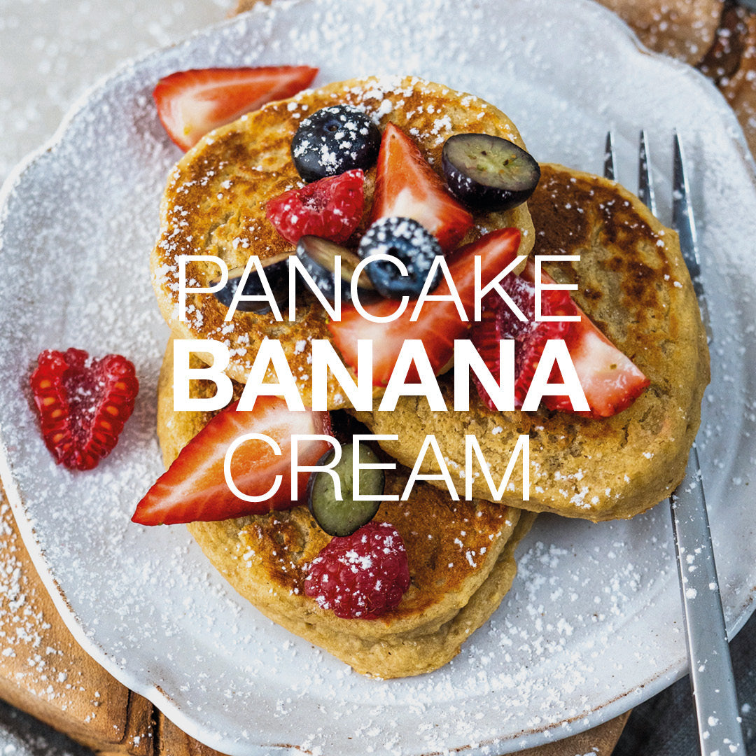 Pancake Banana Cream con frutta, fotografia ufficiale Herbalife Italia di una ricetta diversa dalle due preparazioni illustrate.